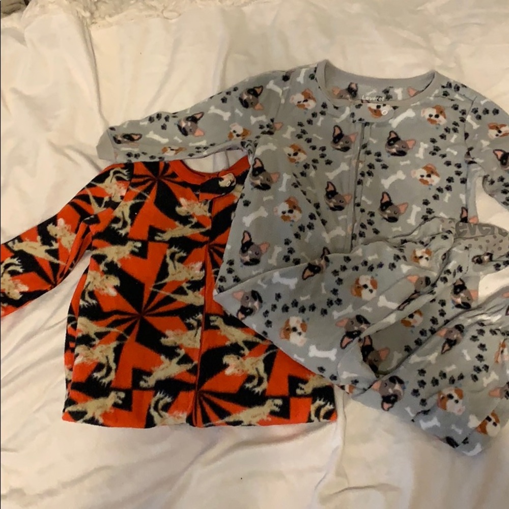 Two boy footed pajamas